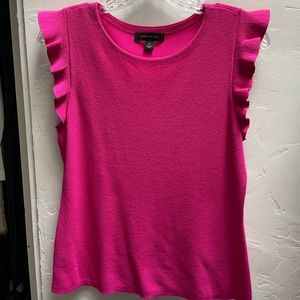 Cute sleeveless shirt, fuscia color and great with jeans. Light sweater material